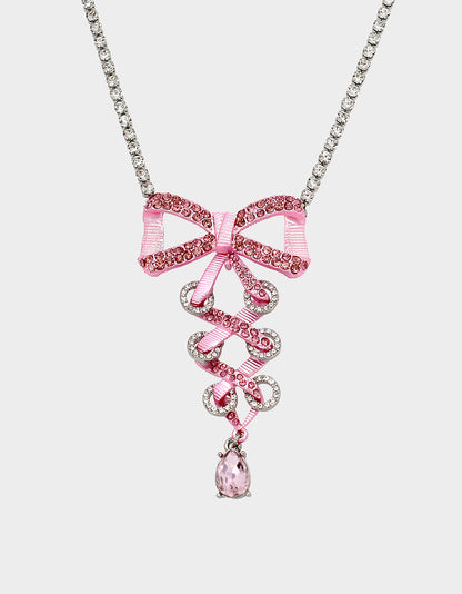 PINK BOWS BOW CORSET PENDANT PINK - JEWELRY - Betsey Johnson