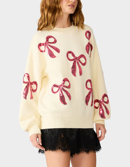 SEQUIN BOW SWEATER CREAM - APPAREL - Betsey Johnson