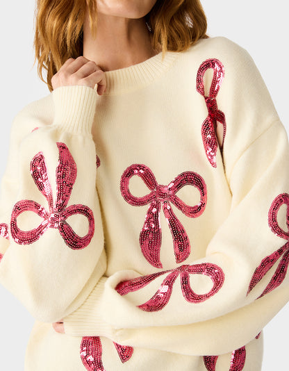 SEQUIN BOW SWEATER CREAM - APPAREL - Betsey Johnson