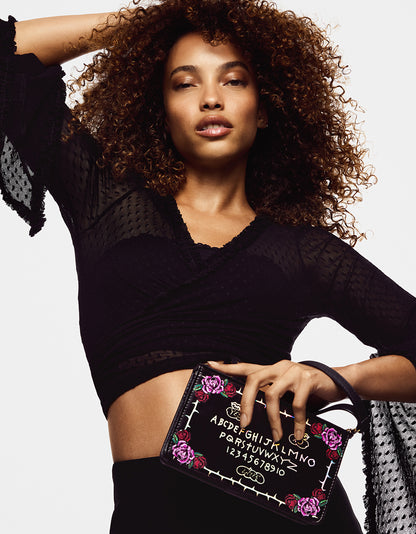 MIDNIGHT MESSAGES WRISTLET BLACK/MULTI - HANDBAGS - Betsey Johnson