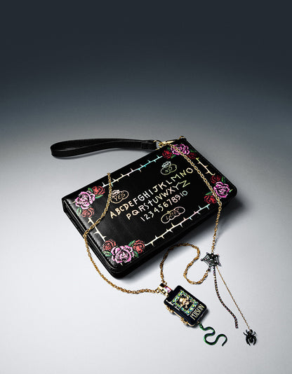 MIDNIGHT MESSAGES WRISTLET BLACK/MULTI - HANDBAGS - Betsey Johnson